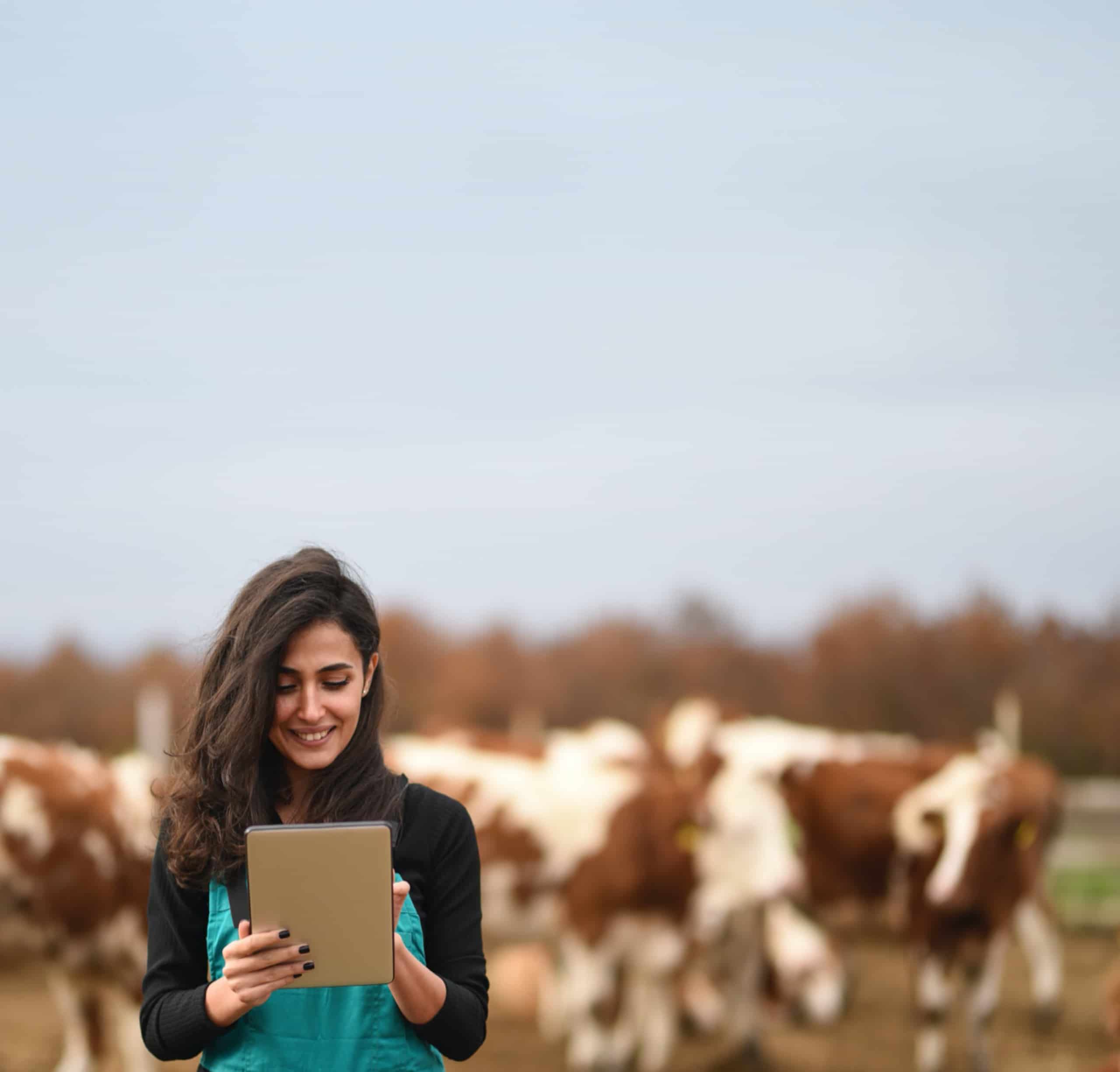 Young female farmer using a digital tablet