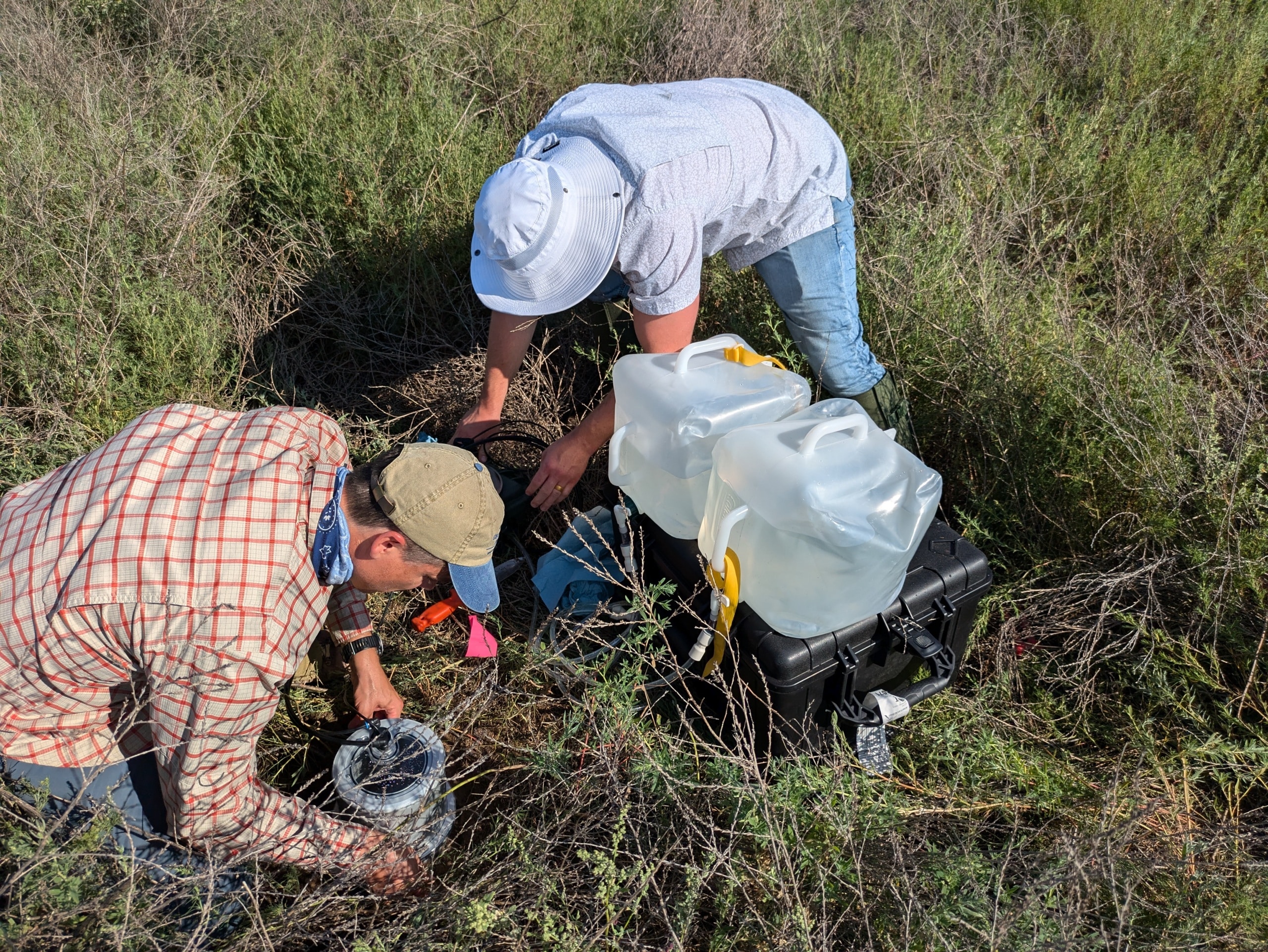 Project co-PI Anthony Kendall and Ph.D. student Jake Stid set up automated infiltrometer to measure soil hydraulic conductivity. Photo credit James Bingaman