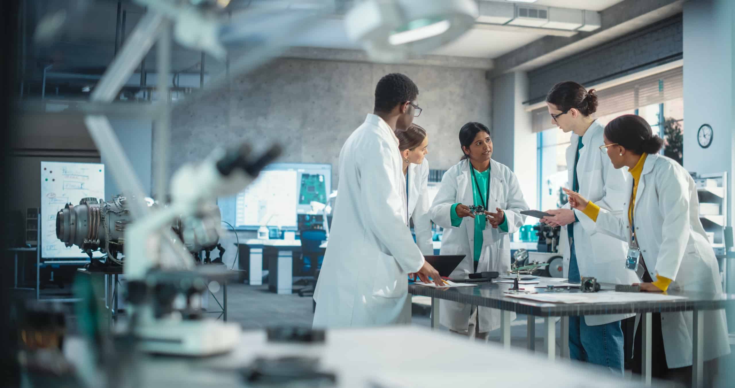 Scientists around table